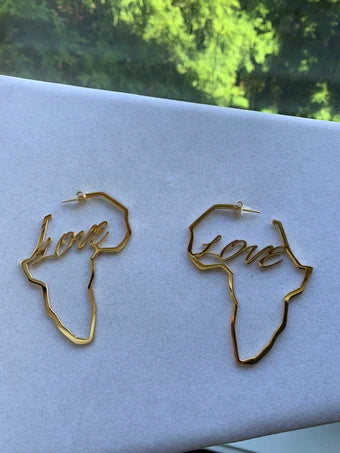 Beautiful gold Africa shaped earrings with love script, gold love africa earrings, gold stud earrings, African inspired earrings